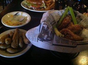 Wings in a newspaper.