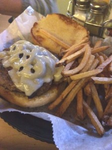 There's a burger under all that cheese. Really.