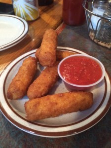 Cheese sticks breaded in shaved gold?