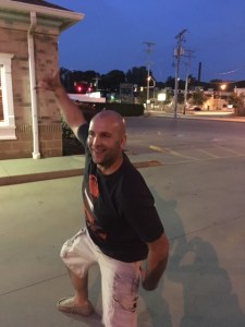 Practicing his cheerleading moves