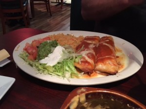 Mexican stuff in shells with sauce and cheese, take two