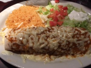 Mexican stuff in a shell with sauce and cheese, take three. No wonder they only have like three things photographed on the menus